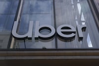 FILE - An Uber sign is displayed at the company's headquarters in San Francisco, Monday, Sept. 12, 2022. Joseph Sullivan, the former chief security officer for Uber has been sentenced to probation for trying to cover up a 2016 data breach in which hackers accessed tens of millions of customer records from the ride-hailing service, Thursday, May 4, 2023. (AP Photo/Jeff Chiu, File)
