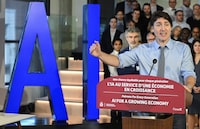 Prime Minister Justin Trudeau speaks during an announcement on innovation for economic growth in advance of the 2024 federal budget in Montreal, Sunday, April 7, 2024. Canada's federal government has used artificial intelligence in nearly 300 projects and initiatives, new research has found — including to help predict the outcome of tax cases, sort temporary visa applications and promote diversity in hiring. THE CANADIAN PRESS/Graham Hughes