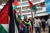 South African residents wave Palestinian flags as they wait for members of the South African legal team to arrive from The Hague, Netherlands, where they represented the country in a two-day hearing against Isreal at the International Court of Justice (ICJ), at the OR Tambo International Airport in Ekurhuleni, South Africa, on January 14, 2024. South Africa on January 11, 2024 accused Israel of breaching the UN Genocide Convention, saying that even the deadly October 7 Hamas attack could not justify such alleged actions, as it opened a case at the top UN court.
Pretoria has lodged an urgent appeal to the International Court of Justice (ICJ) to force Israel to "immediately suspend" its military operations in Gaza. (Photo by Alaister Russell / AFP) (Photo by ALAISTER RUSSELL/AFP via Getty Images)
