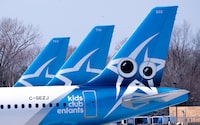 Air Transat palnes are seen on the tarmac at Montreal-Trudeau International Airport in Montreal, on April 8, 2020. 
Air Transat and the union representing its 2,100 flight attendants say they have reached a new tentative agreement. THE CANADIAN PRESS/Paul Chiasson