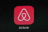 FILE - The Airbnb app icon is displayed on an iPad screen in Washington, D.C., on May 8, 2021. Airbnb says it's cracking down on fake listings, which are emerging as a major problem for customers of the short-term rental site. Airbnb said Wednesday Sept. 20 2023 it has removed 59,000 fake listings and blocked another 157,000 from joining the site this year. Fake listings and high cleaning fees are among several issues that customers are raising with Airbnb. (AP Photo/Patrick Semansky, File)