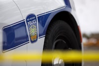 A Peel Regional Police logo is shown at a crime scene in Brampton, Ont., on Thursday, Nov. 7, 2019.&nbsp;Peel Regional Police say a youth has been charged with second degree murder in connection with the violent killing of an international student in the summer.THE CANADIAN PRESS/Cole Burston