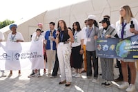 DUBAI, UNITED ARAB EMIRATES - DECEMBER 06: Environmental activist Rachel Parent speaks at a protest event to promote global climate education on day seven of the UNFCCC COP28 Climate Conference at Expo City Dubai on December 06, 2023 in Dubai, United Arab Emirates. The COP28, which is running from November 30 through December 12, is bringing together stakeholders, including international heads of state and other leaders, scientists, environmentalists, indigenous peoples representatives, activists and others to discuss and agree on the implementation of global measures towards mitigating the effects of climate change. (Photo by Sean Gallup/Getty Images)