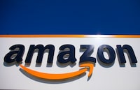 FILE - The Amazon logo is seen in Douai, northern France, Thursday, April 16, 2020. Amazon said Wednesday, April 3, 2024, it's cutting hundreds of jobs in its cloud computing unit AWS as part of a strategic shift. (AP Photo/Michel Spingler, File)