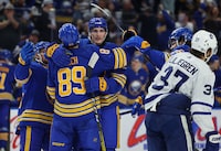 Dec 21, 2023; Buffalo, New York, USA;  Buffalo Sabres right wing Tage Thompson (72) celebrates his goal with teammates during the second period against the Toronto Maple Leafs at KeyBank Center. Mandatory Credit: Timothy T. Ludwig-USA TODAY Sports