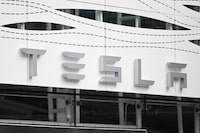 (FILES) The Tesla logo is seen at the Santa Monica Place store in Santa Monica, California, on March 20, 2023. Tesla plans to lay off "more than 10 percent" of its global workforce, news site Electrek reported on April 15, 2024, publishing an email from Chief Executive Elon Musk announcing the cuts. (Photo by Patrick T. Fallon / AFP) (Photo by PATRICK T. FALLON/AFP via Getty Images)