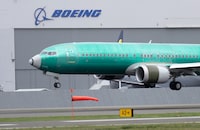 FILE - In this April 10, 2019, file photo, a Boeing 737 Max 8 airplane lands following a test flight at Boeing Field in Seattle. Federal investigators have confirmed in a report Thursday, March 7, 2023, an account by pilots who say the rudder controls on their Boeing Max jetliner failed during a landing last month. (AP Photo/Ted S. Warren, File)