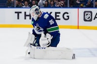 Mar 9, 2024; Vancouver, British Columbia, CAN; Vancouver Canucks goalie Thatcher Demko (35) makes a save against the Winnipeg Jets in the first period at Rogers Arena. Mandatory Credit: Bob Frid-USA TODAY Sports