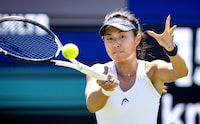 Canada's Carol Zhao plays a forehand return to Russia's Veronika Kudermetova during their women's singles match on the third day of the Libema Open tennis tournament at Rosmalen on June 14, 2023. (Photo by Sander Koning / ANP / AFP) / Netherlands OUT (Photo by SANDER KONING/ANP/AFP via Getty Images)