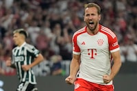 Bayern's Harry Kane celebrates after scoring his side's third goal from a penalty kick during the Champions League group A soccer match between Bayern Munich and Manchester United at the Allianz Arena stadium in Munich, Germany, Wednesday, Sept. 20, 2023. (AP Photo/Matthias Schrader)