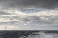FILE - The turbines of America's first offshore wind farm are seen from a tour boat off the coast of Block Island, R.I., Oct. 17, 2022. The Biden administration approved a new offshore wind project off the Massachusetts coast Tuesday, April 2, 2024. (AP Photo/David Goldman, File)
