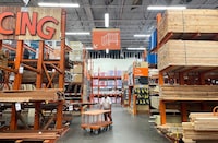 A person shops in the lumber section of a Home Depot on Sept.13, 2022 in Huntington Park, California.