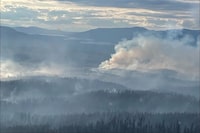 The latest evacuation order issued due to a wildfire in British Columbia covers a rural area north of Prince George in a region straddling the boundaries of two regional governments. Fires burn near Great Beaver Lake, B.C.in this recent file photo. THE CANADIAN PRESS/HO-BC Wildfire Service