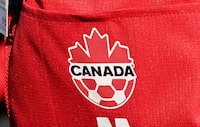 Ontario has conditionally committed to giving Toronto up to $97 million for the city's FIFA World Cup hosting duties. Toronto is set to host three games in the 2026 World Cup that will also see games in Vancouver in addition to games in both the U.S. and Mexico. A detail view of Canada branding on a team uniform ahead of the FIFA Women's World Cup in Melbourne, Australia, Monday, July 17, 2023. THE CANADIAN PRESS/Scott Barbour
