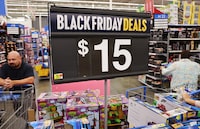 People shop ahead of Black Friday at a Walmart Supercenter on Nov. 14 in Burbank, Cal.
