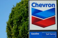 A Chevron logo is shown at a gas station in San Francisco, Monday, Oct. 23, 2023. Chevron is buying Hess Corp. for $53 billion as major producers seize the initiative while oil prices surge. (AP Photo/Jeff Chiu)