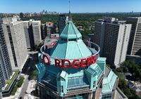 FILE PHOTO: FILE PHOTO: The Rogers Building, the green-topped corporate campus of Canadian media conglomerate Rogers Communications is seen in downtown Toronto, Ontario, Canada July 14, 2022.  REUTERS/Chris Helgren/File Photo