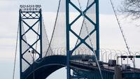 Traffic flows over the Ambassador Bridge in Detroit Monday, Feb. 14, 2022 after protesters blocked the major border crossing for nearly a week in Windsor, Ontario. (AP Photo/Paul Sancya)