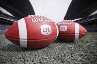 New CFL balls are photographed at the Winnipeg Blue Bombers stadium in Winnipeg on May 24, 2018. The CFL postponed its 2020 global draft due to the COVID-19 pandemic Tuesday. The draft was scheduled to be held April 16. It will now coincide with the opening of training camps. THE CANADIAN PRESS/John Woods