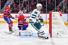 MONTREAL, CANADA - NOVEMBER 29:  Logan Couture #39 of the San Jose Sharks scores on goaltender Jake Allen #34 of the Montreal Canadiens in the third period at Centre Bell on November 29, 2022 in Montreal, Quebec, Canada.  The Sharks won 4-0.  (Photo by Minas Panagiotakis/Getty Images)