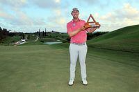 SOUTHAMPTON, BERMUDA - OCTOBER 30: Seamus Power of Ireland holds the trophy after winning the Butterfield Bermuda Championship at Port Royal Golf Course on October 30, 2022 in Southampton, . (Photo by Andy Lyons/Getty Images)