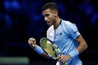 Tennis - ATP Finals Turin - Pala Alpitour, Turin, Italy - November 15, 2022  Canada's Felix Auger Aliassime celebrates winning his group stage match against Spain's Rafael Nadal REUTERS/Guglielmo Mangiapane