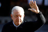 FILE PHOTO: Mexican President Andres Manuel Lopez Obrador waves after casting his vote on the recall referendum on his presidency in Mexico City, Mexico April 10, 2022. REUTERS/Gustavo Graf/File Photo