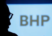 BHP's logo is projected on a screen during a round-table meeting with journalists in Tokyo, Japan, June 5, 2017.