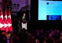 Prime Minister Justin Trudeau speaks at the Parliamentary Press Gallery Dinner at the Museum of History in Gatineau, Que., on Saturday, Oct. 22, 2022. THE CANADIAN PRESS/Spencer Colby