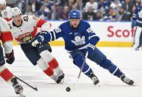 May 2, 2023; Toronto, Ontario, CANADA;  Toronto Maple Leafs forward William Nylander (88) skates with the puck against Florida Panthers defenseman Gustav Forsling (42) in the third period in game one of the second round of the 2023 Stanley Cup Playoffs at Scotiabank Arena. Mandatory Credit: Dan Hamilton-USA TODAY Sports