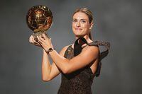 Barcelona's Alexia Putellas celebrates after winning the women's Ballon d'Or during the 66th Ballon d'Or ceremony at Theatre du Chatelet in Paris, France, Monday, Oct. 17, 2022. (AP Photo/Francois Mori)
