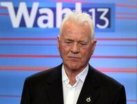 Austro-Canadian billionaire Frank Stronach waits for the start of a TV debate after national elections in Vienna, Austria, Sept. 29, 2013.