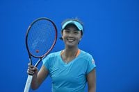 (FILES) In this file photo taken on January 16, 2017, Peng Shuai, of China, celebrates her win against Daria Kasatkina, of Russia, during their women's singles first round match on day one of the Australian Open tennis tournament in Melbourne. - A US rights monitor sounded the alarm on January 31, 2022, over athletes' safety at China's upcoming Winter Olympics, after the host threatened "punishment" for anti-Beijing comments. (Photo by PAUL CROCK / AFP) / --IMAGE RESTRICTED TO EDITORIAL USE - STRICTLY NO COMMERCIAL USE-- (Photo by PAUL CROCK/AFP via Getty Images)