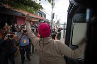 NDP Leader Jagmeet Singh waves to supporters as he gets back on his bus after a campaign stop outside his campaign office in Burnaby, B.C., on Tuesday, August 31, 2021. Darryl Dyck/The Globe and Mail