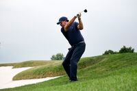 BEDMINSTER, NEW JERSEY - JULY 29: Team Captain Phil Mickelson of Hy Flyers GC plays his second shot on the 15th hole during day one of the LIV Golf Invitational - Bedminster at Trump National Golf Club Bedminster on July 29, 2022 in Bedminster, New Jersey. (Photo by Cliff Hawkins/Getty Images)