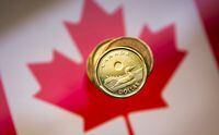 A loonie is pictured in Toronto on Jan. 23, 2015.