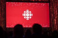 The CBC logo is projected onto a screen in Toronto on May 29, 2019. The CBC and Radio-Canada are returning to Twitter after pausing activity last month over their designation as "government-funded media" by the social media platform. THE CANADIAN PRESS/Tijana Martin
