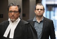 Gabriel Sohier Chaput follows his lawyer as he arrives for sentencing in Montreal, Wednesday, July 12, 2023. Sohier Chaput was found guilty in January of promoting hatred against Jews, in connection with an article he wrote for the neo-Nazi website the Daily Stormer. THE CANADIAN PRESS/Christinne Muschi