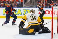 Edmonton Oilers forward Zach Hyman (18) scores a goal against Pittsburgh Penguins goaltender Tristan Jarry (35) during the first period at Rogers Place in Edmonton on Dec. 1, 2021.