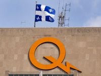 A Hydro-Québec logo is seen on the public utility's head office building, Thursday, Feb. 26, 2015, in Montreal. THE CANADIAN PRESS/Ryan Remiorz