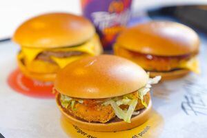 The Sweet Chili Junior Chicken, (clockwise from centre) the Surf ‘N Turf Burger and the Chicken Cheeseburger from McDonalds Canada's new remix menu are photographed In Toronto, on Thursday, March 28, 2024. THE CANADIAN PRESS/Chris Young