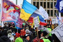 People take part in a protest against the delivery of weapons to Ukraine and in support of peace negotiations between Russia and Ukraine, amid Russia's invasion of Ukraine, in Berlin, Germany February 25, 2023. REUTERS/Fabrizio Bensch