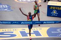 Lawrence Cherono edges Lelisa Desisa for first place in the men's race at the 123rd Boston Marathon, in Boston, Ma., on April 15, 2019.