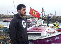 Indigenous fisherman Robert Syliboy stands on the wharf in Saulnierville, N.S. on Wednesday, Oct. 21, 2020. THE CANADIAN PRESS /Andrew Vaughan