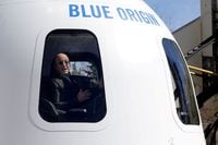 Amazon and Blue Origin founder Jeff Bezos addresses the media about the New Shepard rocket booster and Crew Capsule mockup, at the 33rd Space Symposium, in Colorado Springs, Colo., on April 5, 2017.