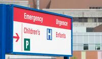 A sign directing visitors to the emergency department is shown at CHEO, in Ottawa, Friday, May 15, 2015. Several pediatricians with the Alberta Medical Association are calling for stronger public health measures as children's hospitals continue to feel the strain of several respiratory illnesses. THE CANADIAN PRESS/Adrian Wyld