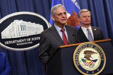 WASHINGTON, DC - JANUARY 26: U.S. Attorney General Merrick Garland, joined by Director of the Federal Bureau of Investigation (FBI) Christopher Wray, delivers remarks on an international ransomware enforcement action at the U.S. Justice Department on January 26, 2023 in Washington, DC. The Justice Department announced that the FBI has seized the website of HIVE, a notorious ransomware gang, which has extorted more than $100 million from victim organizations. (Photo by Kevin Dietsch/Getty Images)