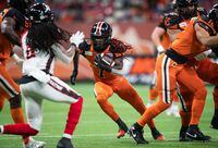 B.C. Lions' Lucky Whitehead (7) carries the ball against the Ottawa Redblacks during the first half of a CFL football game in Vancouver, on Saturday, September 11, 2021. THE CANADIAN PRESS/Darryl Dyck