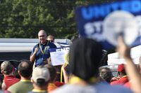 United Auto Workers Union President Shawn Fain speak to members of Local 862 at a rally in Louisville, Ky., Thursday, Aug. 24, 2023. The demands that a more combative United Auto Workers union has made of General Motors, Stellantis and Ford — demands that even the UAW's president has called “audacious” — are edging it closer to a strike when its current contract ends Sept. 14. (AP Photo/Timothy D. Easley)