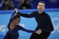 FILE - Vanessa James and Eric Radford, of Canada, compete in the pairs team free skate program during the figure skating competition at the 2022 Winter Olympics, Monday, Feb. 7, 2022, in Beijing. In a century-old sport that had been largely European until just a few decades ago, some still wonder how more Black athletes can make a lasting imprint on competitive figure skating. “If you don’t see yourself in the sport, how can you believe that you belong, how can you believe that you can be the best, how do you know that you can be creative or that you’ll be accepted for your uniqueness?” James said. (AP Photo/David J. Phillip, File)